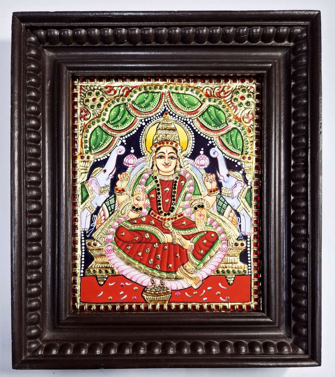 Gajalakshmi Tanjore Painting with 22K gold foil, Jaipur stones, and teakwood frame, 13x11 inches, Indian wall decor.