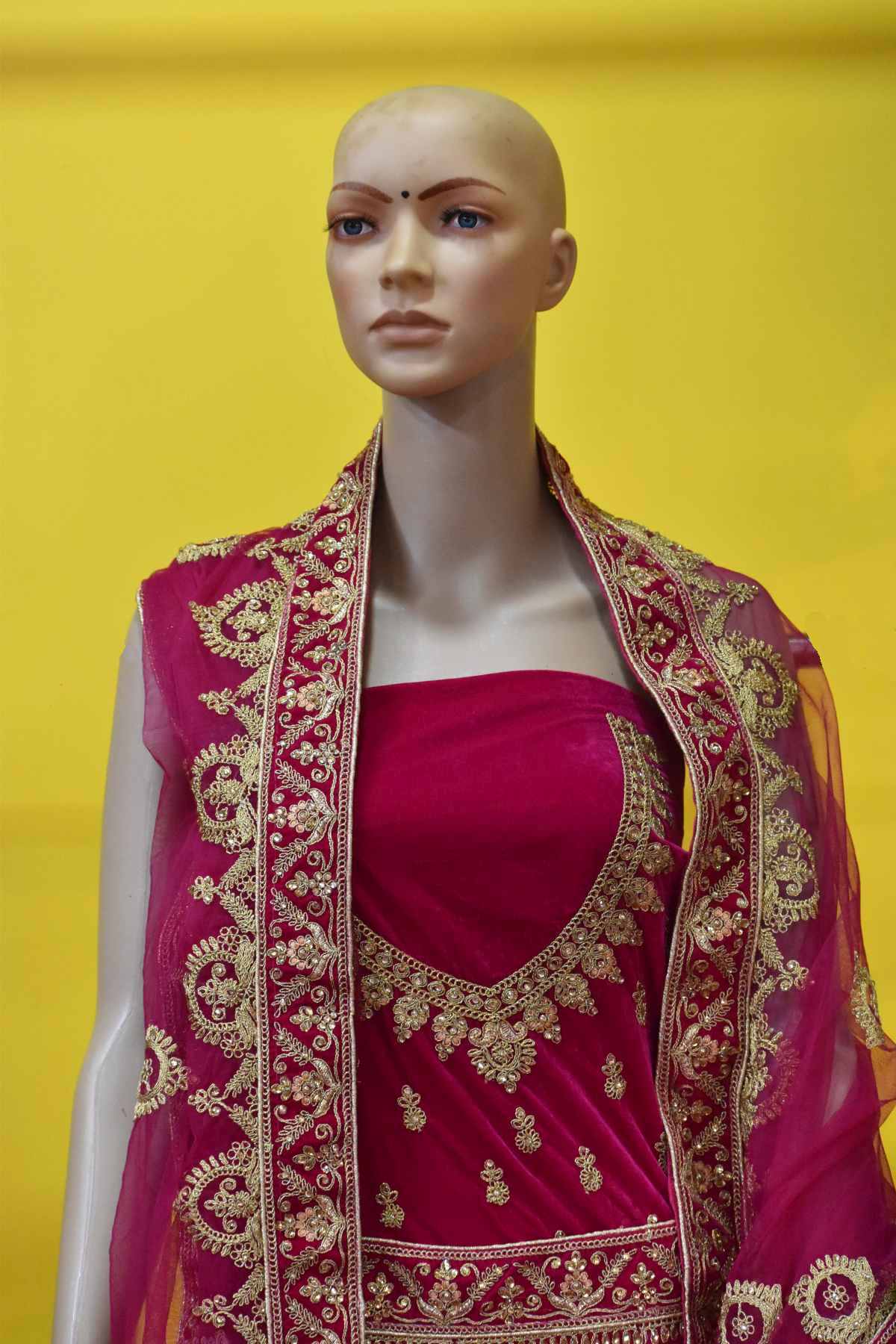 Bridal Lehenga Magenta pink with full golden embroidery work