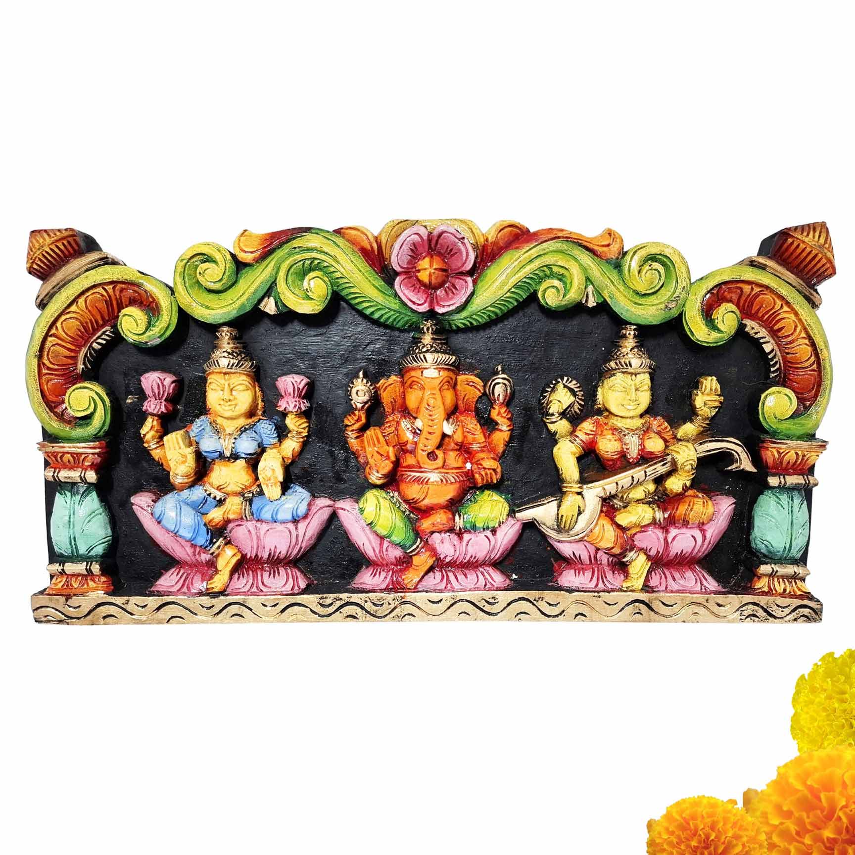 Handcrafted wooden Lakshmi Ganesha Saraswati wall panel made from solid country wood with detailed hand-painted carving, designed as Hindu wall decor for home temples, meditation rooms, living rooms, and spiritual interiors.