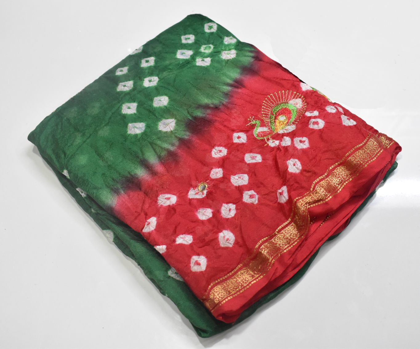 Bandhani Saree in bright green color body with red border