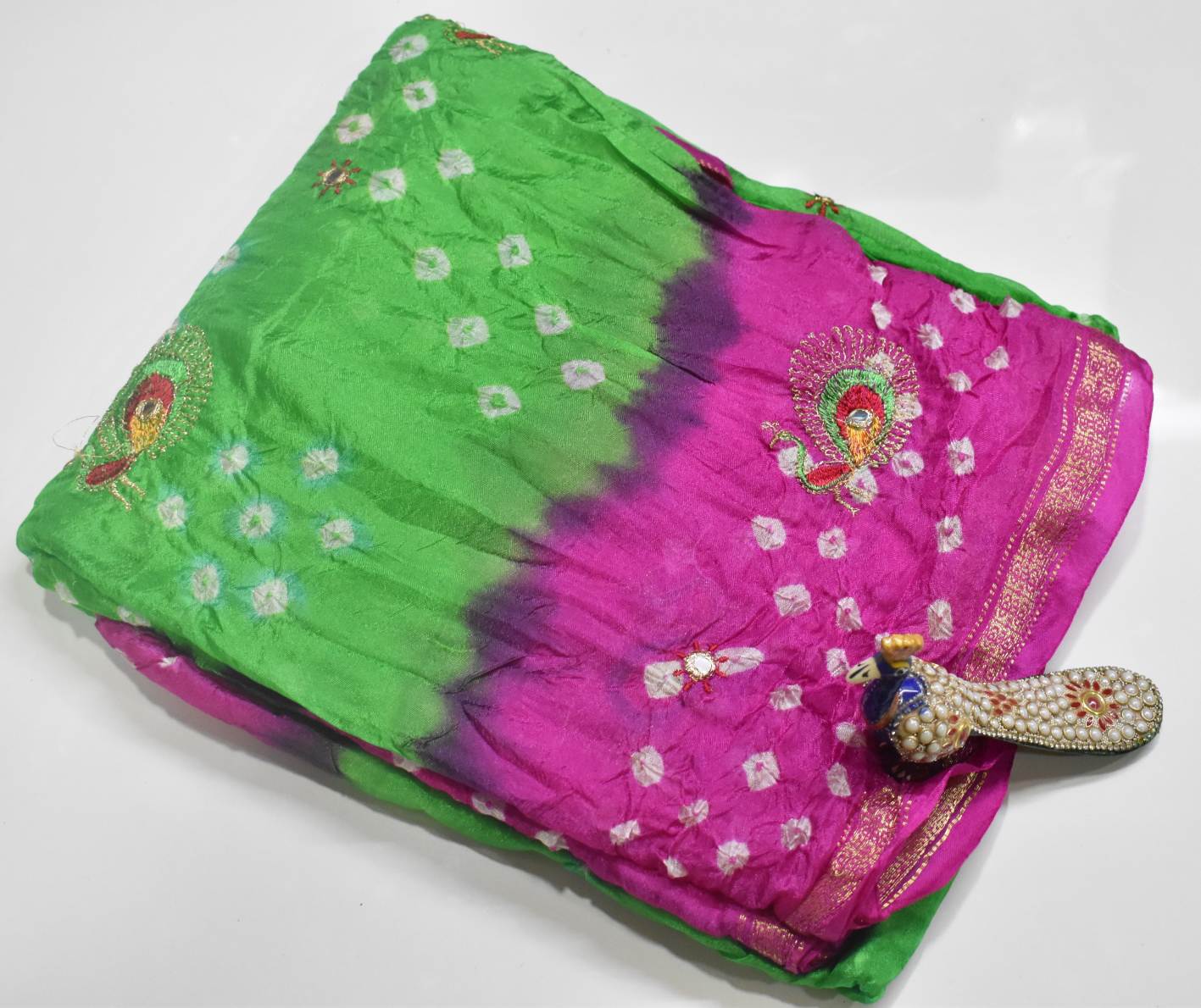 Jaipur Bandhani Saree in leaf green body color with pink border