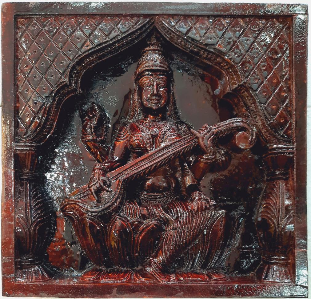 Wooden Saraswathi idol