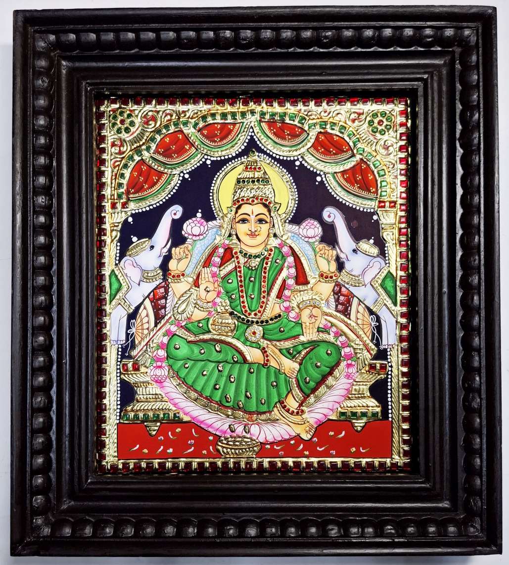 Lakshmi Tanjore painting with 22K gold foil in teakwood frame, 15x13 inches, handmade Indian art for pooja room or spiritual gift.