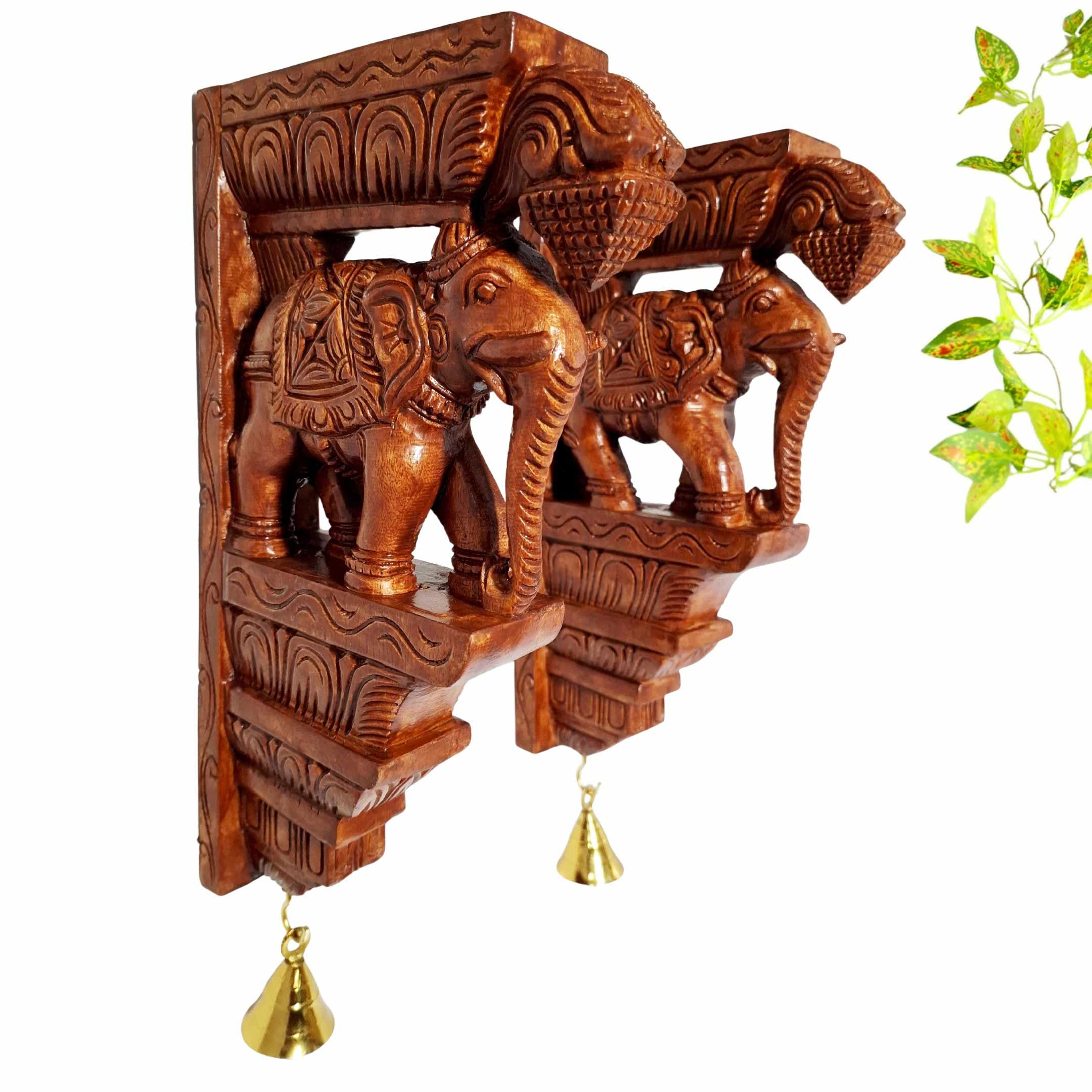 Hand carved wooden elephant wall brackets set with brass bells South Indian decor
