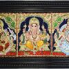 Traditional Tanjore painting of Ganesha, Lakshmi & Saraswathi with 22K gold foil on wooden panel - 31x15 inch teakwood framed sacred art for home temples and spiritual gifts