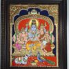 JLine Arts' authentic large Shiva Family Tanjore painting, 28x22 inches, depicting Lord Shiva with Parvati, Ganesha, and Kartikeya. Handcrafted with 22K gold foils, set in a solid teakwood frame behind unbreakable acrylic glass. Handmade Indian religious art.