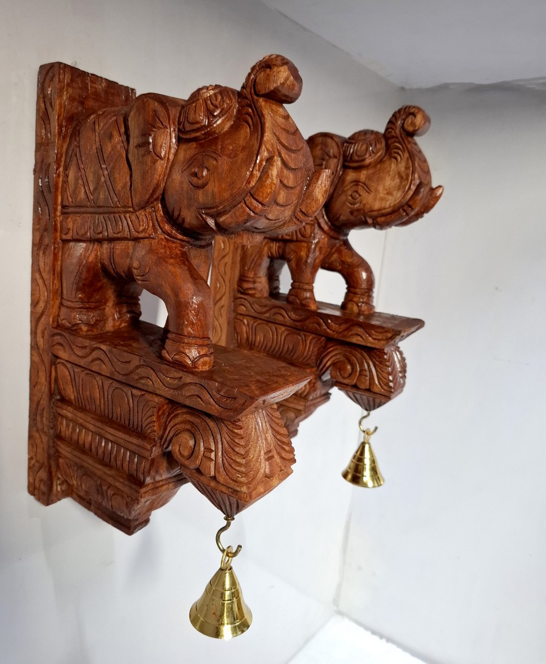 12 inch wooden elephant wall bracket pair with brown finish and brass bells handcrafted corbels.