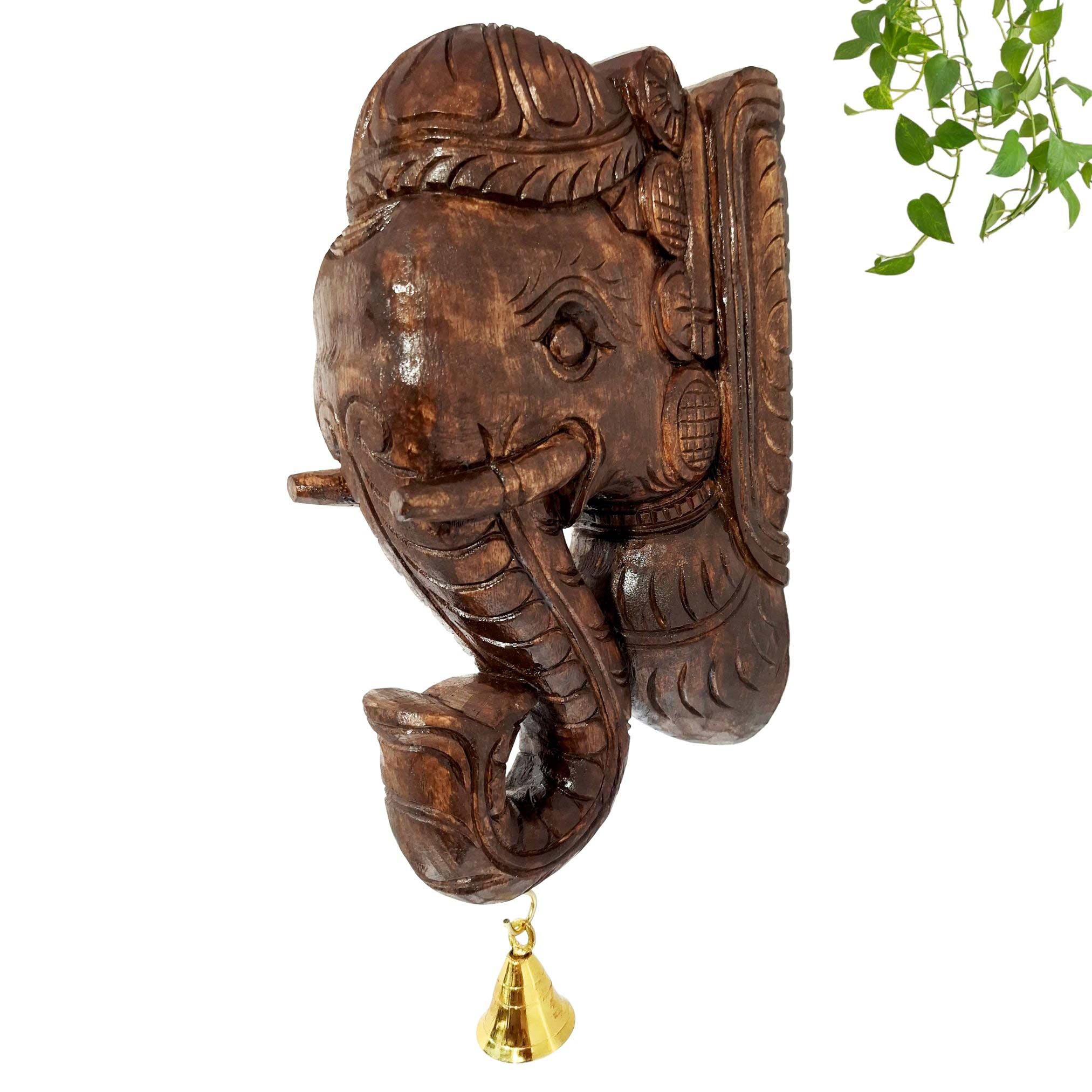 Hand-carved wooden elephant head wall bracket with brass bell, brown finish pooja room and home wall decor.