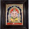 Handcrafted Ganesha Tanjore Painting with 22K gold foil and Jaipur gemstones, set in a premium teakwood frame, size 15x13 inches. Authentic South Indian artwork, perfect for pooja room, home décor, or gifting. Traditional Thanjavur painting by skilled artisans, featuring divine detailing, vibrant colors, and long-lasting craftsmanship.