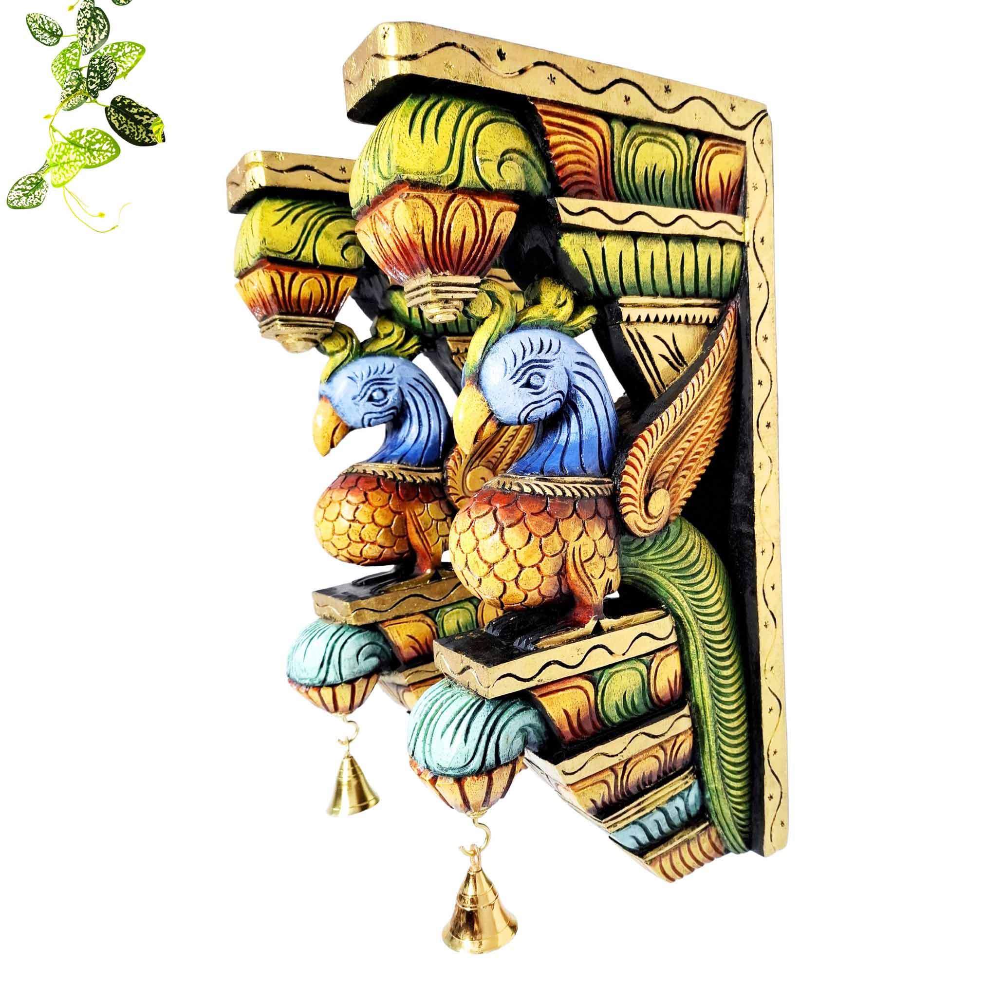 Hand carved wooden peacock wall bracket pair 18 inches multicolor finish with brass hanging bells, traditional South Indian temple style wall corbels for home decor, pooja room, mandir decoration, suitable for buyers in USA, UAE, Europe, Australia, Singapore and Malaysia.