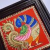 Tanjore Painting Peacock, framed in Teakwood with 22K Gold Foils, is an exquisite Indian handmade artwork, housewarming gift, ready to ship.