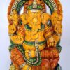 The Wooden Ganesh Statue is an 18-inch handmade carved idol of the Hindu deity with an elephant head and multiple arms, adorned in intricate jewellery and ornate patterns, ideal for home decor or a Pooja room Ganesha statue.