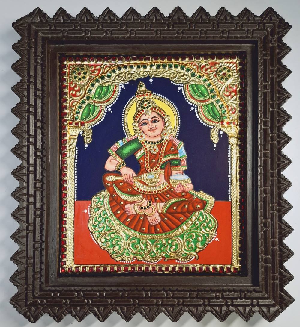 Framed Annapoorani Tanjore painting with 22K gold foil and crystal rhinestones – 15x13 inch Indian spiritual artwork, perfect for pooja room or gifting.
