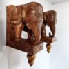 Hand-carved wooden elephant statue wall bracket pair in vintage finish, 10-inch height, solid country wood, decorative corbels for home or garden.