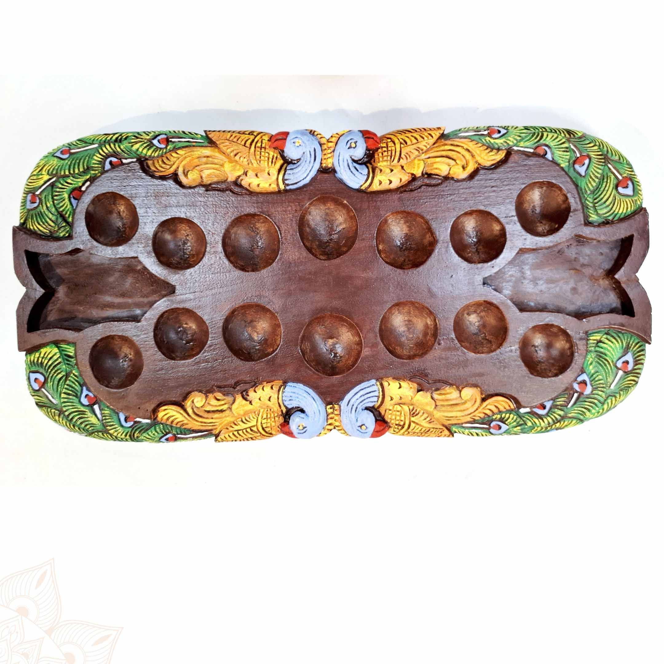 Hand-carved wooden Pallanguli board wall panel with peacock carvings and traditional South Indian design