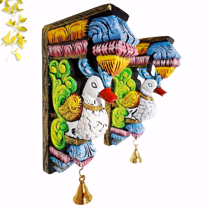 Handcrafted multicolor solid wood Annam wall bracket pair featuring traditional Indian bird carvings, 12 inches high, for pooja room and ethnic home decor.
